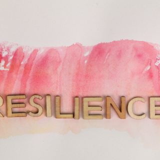 resilience text on pink ink